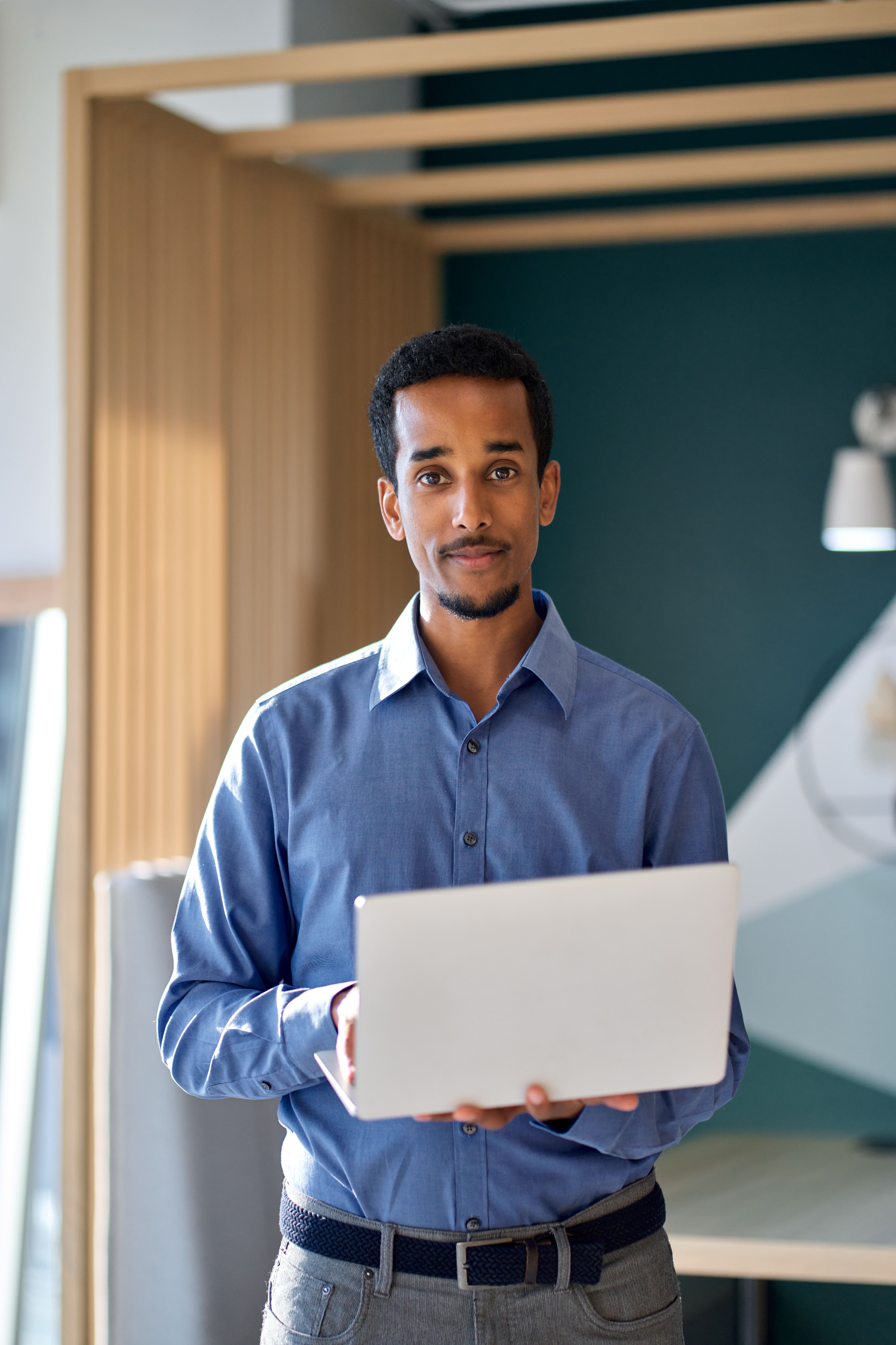 professional business man standing in office with 2023 11 27 05 30 44 utc min